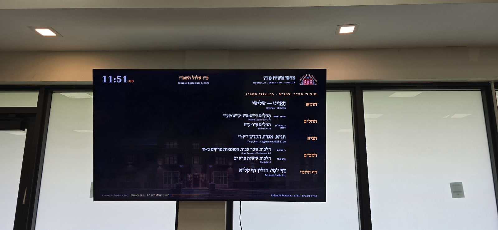 The same board a minute later, showing the Chitas and Rambam screen: chumash, tehillim, Tanya, Rambam and Daf Yomi for the day.